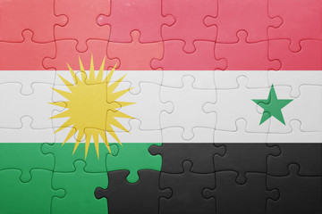 puzzle with the national flag of syria and kurdistan