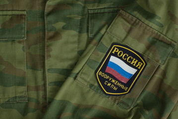 Russian uniform with russian flag on insignia