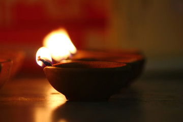 Traditional oil lamps lit on the occasion of Diwali festival