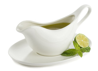 Olive oil in porcelain cup. 