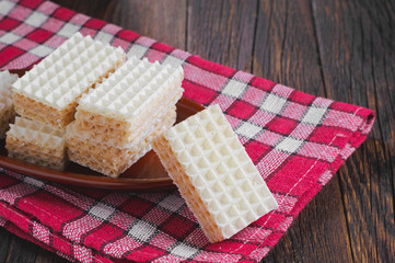 Delicious wafers on table