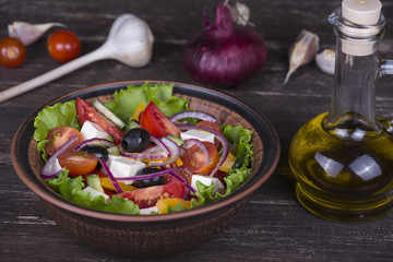 Fresh vegetable greek salad on the table