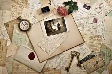 Old letters, photographs and postcards. Wedding background