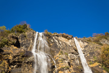 Beautiful waterfall in the forest with rainbow
