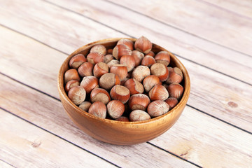 Hazelnuts in a wooden bowl