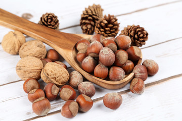 Nuts in a wooden spoon