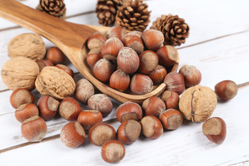 Nuts in a wooden spoon