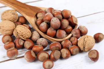 Nuts in a wooden spoon