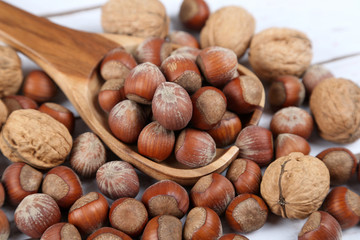 Nuts in a wooden spoon