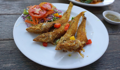 Deep fried fish with turmeric