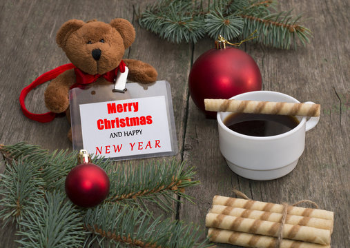 fir-tree branch, bear, coffee, baking and label with an inscript