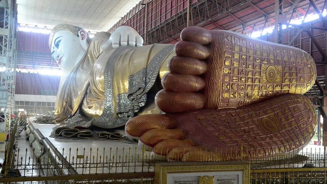 Chauk htat gyi reclining buddha (sweet eye buddha) in yangon, myanmar