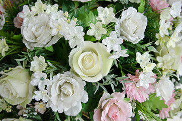 Fototapeta na wymiar artificial rose and flower background