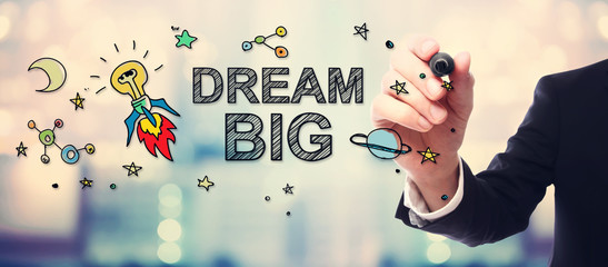 Businessman drawing Dream Big concept