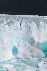 A massive chunk of ice falls off the Perito Moreno Glacier - Argentina