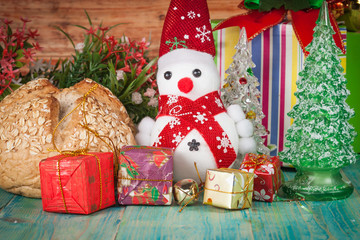 Cheerful Christmas snowman on  background.