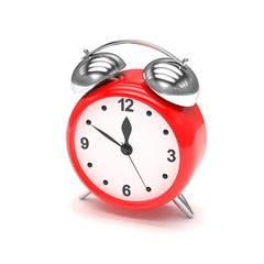 red alarm clock on white