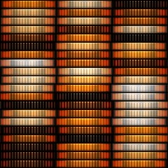 Bronze silver and gold coins stacked on each other.