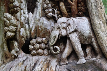 An ancient mural wood carving from Thailand.