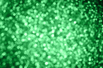 Abstract Holidays Christmas light bokeh background, Green Color.