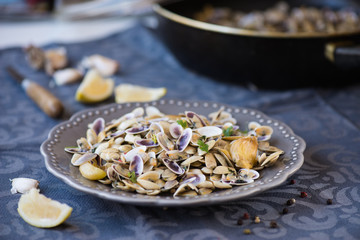 Stir fried clams with roasted paste,garlic, lemon, cilantro
