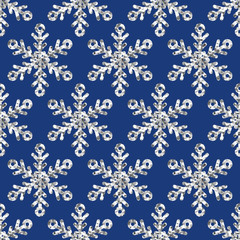 Vector seamless holiday pattern with silver glitter snowflakes.