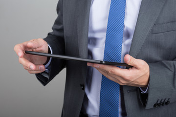 Business man hands holding tablet pc
