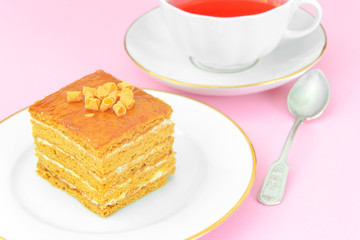Cake with Condensed Milk, Nuts and Honey. Tea, Tableware.
