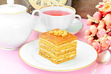 Cake with Condensed Milk, Nuts and Honey. Tea, Tableware.