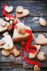 Cookies Valentine's Day cards with Red Row on Wooden Table