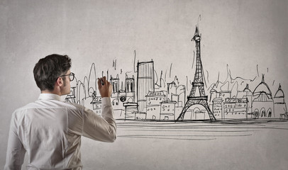 Man drawing a picture of Paris