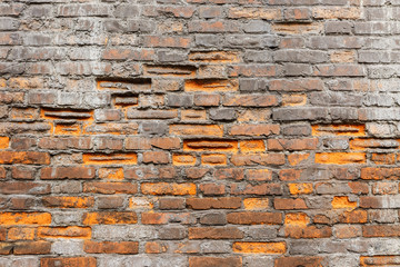 weathering and degradation old vintage brick wall