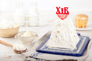 Paskha and kulich, Traditional Russian Orthodox Easter Desserts, Rustic Style.