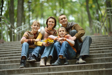 Fototapeta premium family walking in the park 