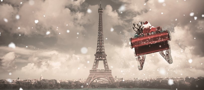 Composite image of santa flying his sleigh