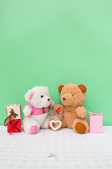 Two teddy with gift. Concept about love and relationship.