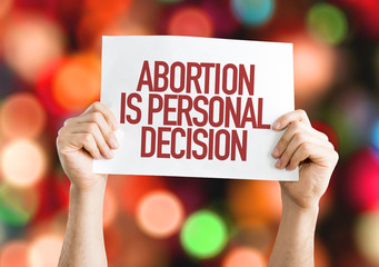 Abortion Is Personal Decision placard with bokeh background