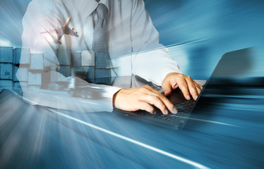 Double exposure of success businessman using computer with container truck ,ship in port and...