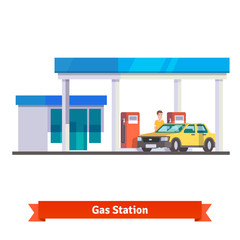 Gas station with man fuelling car