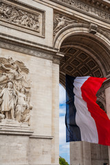 Detail of Triumphal Arch with national flag of France, Paris, Fr