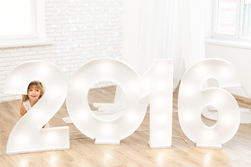 Little girl in christmas decorations