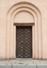 Ancient door in the Christian church. Architecture