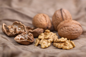 Walnut without shell close-up, and nuts in the shell