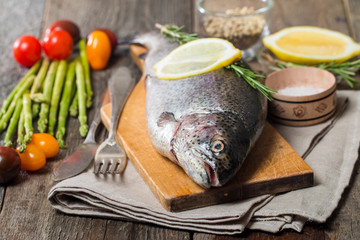 Fresh trout with vegetables, spices and seasoning