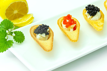 Tartlets with Red and Black Caviar.