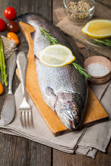Fresh trout with vegetables, spices and seasoning