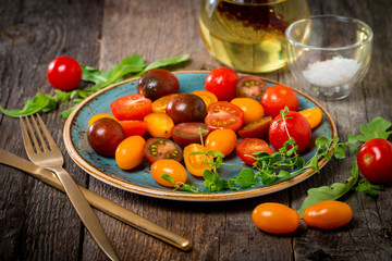Salad with fresh colorful tomatoes