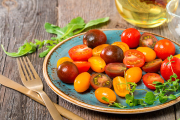 Salad with fresh colorful tomatoes