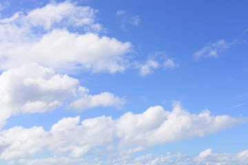 Beautiful blue sky and puffy white cloud background