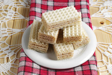 Delicious wafers on table